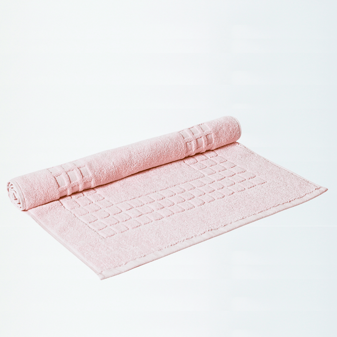 Blush Pink quick-dry cotton bath mat on white background