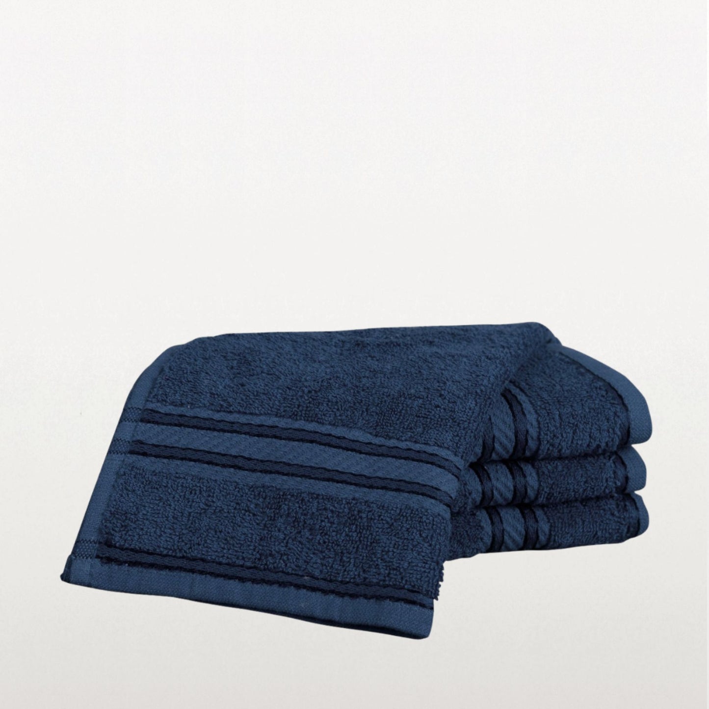 Navy blue face towel on a light gray background