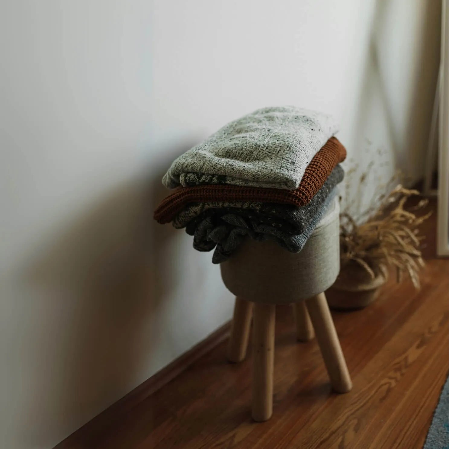 stack of throws and blankets