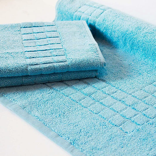 Aqua Blue cotton bath mat made from quick-dry textured fabric 