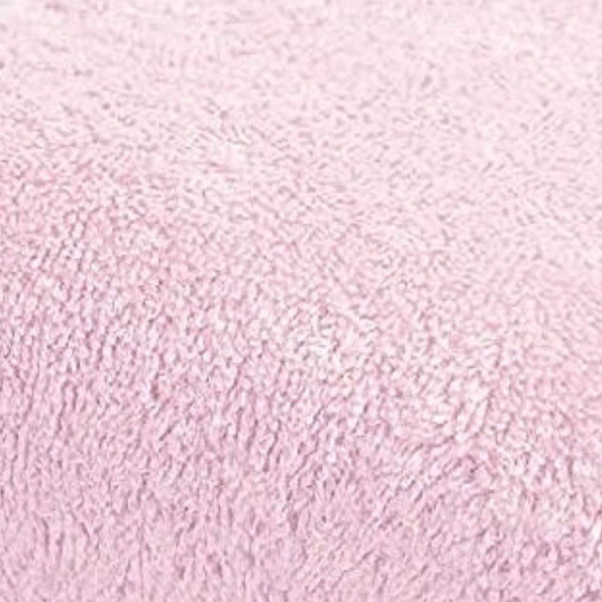 Close up of 500 GSM luxury bathroom towels in blush pink made from soft combed cotton