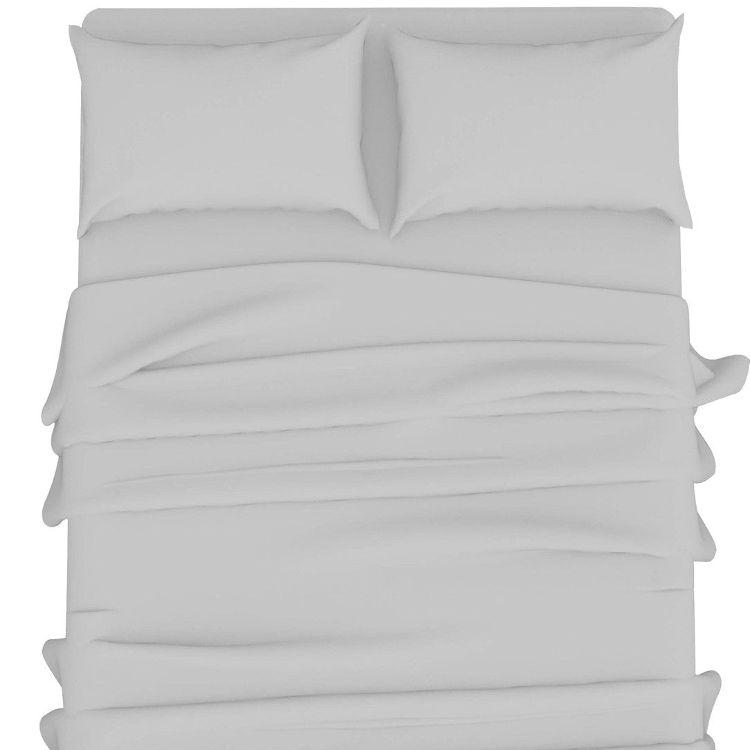 Stack of light gray bedding with two pillows on a white background