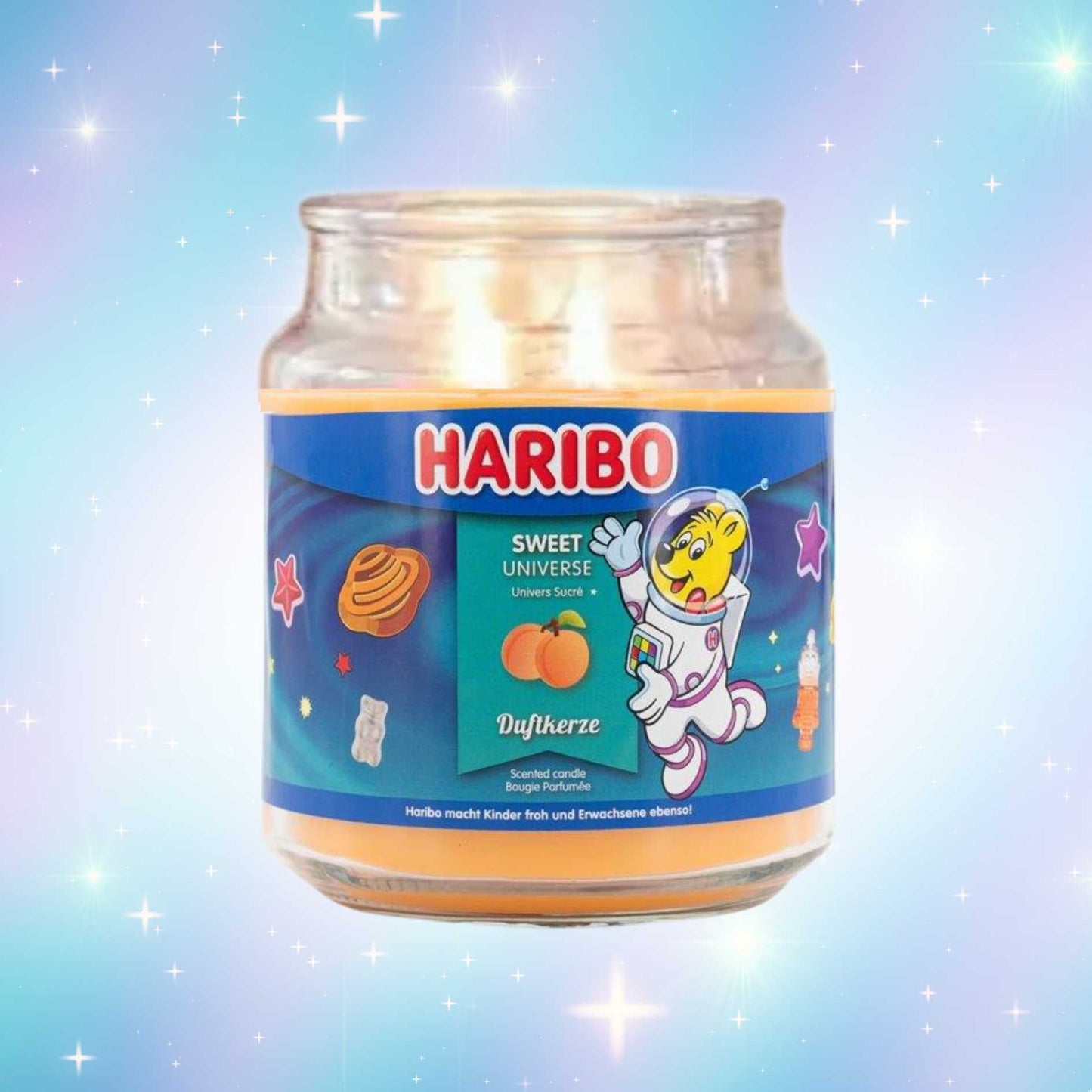 Haribo 'Sweet Universe' candle with an astronaut design on a sparkling, space inspired background