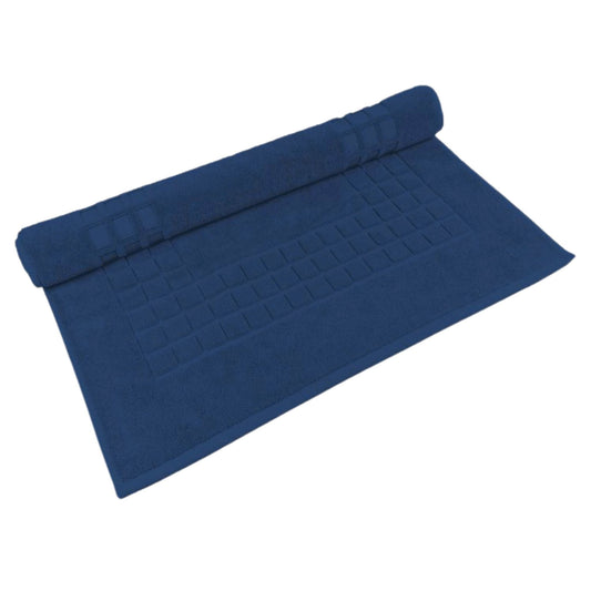 Navy Blue cotton bath mat in textured finish on white background 