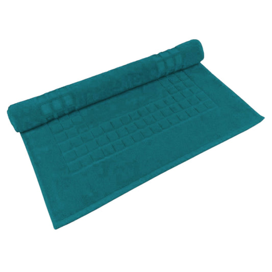Peacock green cotton textured bath mat on white background 