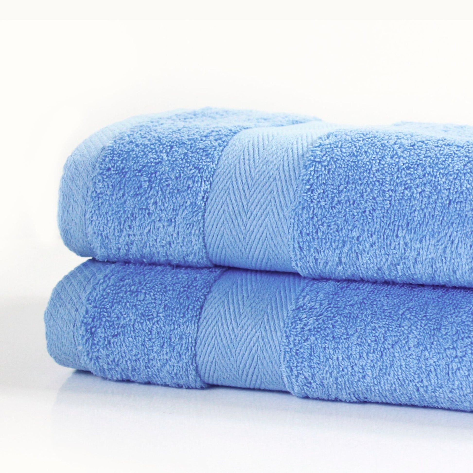 stack of luxury blue bathroom towels