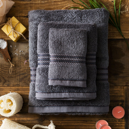 Charcoal Grey bathroom towel, combed cotton, 500GSM, folded and stacked, luxury hotel quality.